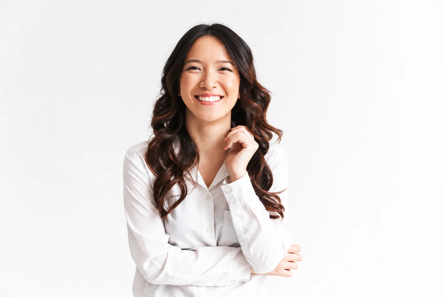 Portrait of a smiling professional in a white blouse